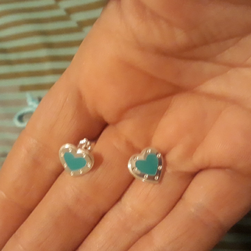 Tiffany and Co. Love earrings.